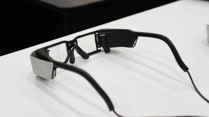 Illustration for article titled I Can Walk and Watch HD Movies at the Same Time With Lumus' See-Through Video Glasses